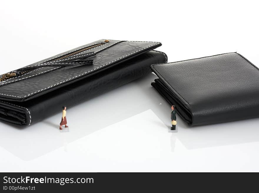 A black leather purse and a black leather wallet. A black leather purse and a black leather wallet