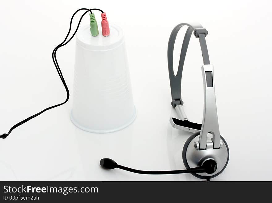 A computer headset over a white background