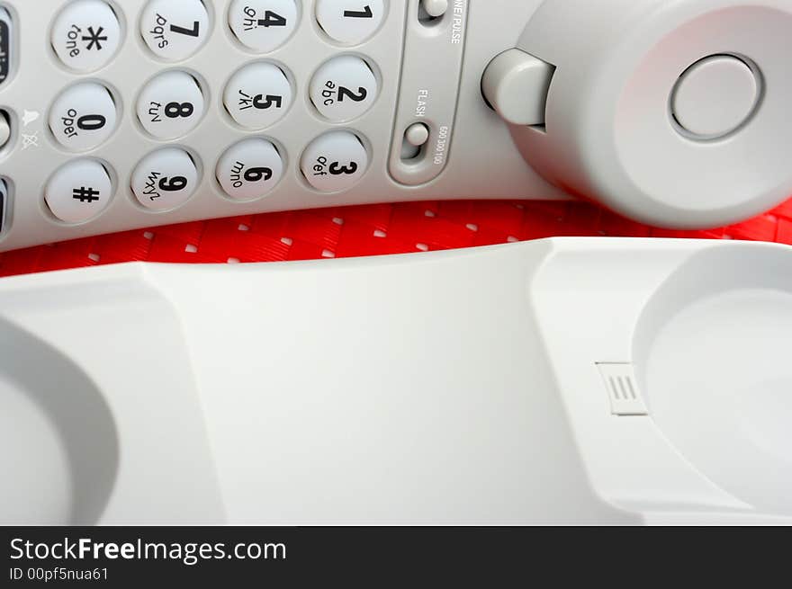 Photo of a telephone over a red background