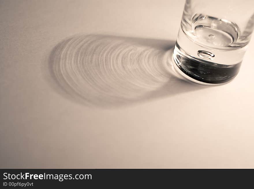 Vodka glass on a white background