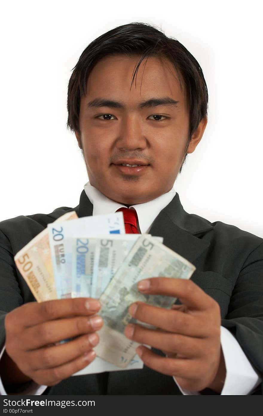 A man counting his money over a white background. A man counting his money over a white background