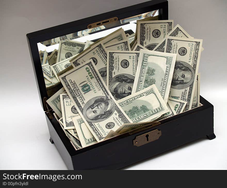 Money in a wooden box