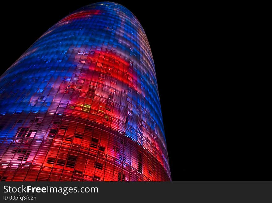 Colorfull skyscraper made of glass during the night