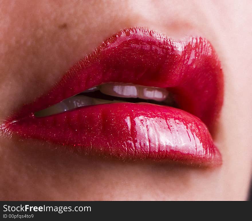 Close up shot of red lips with lipstick