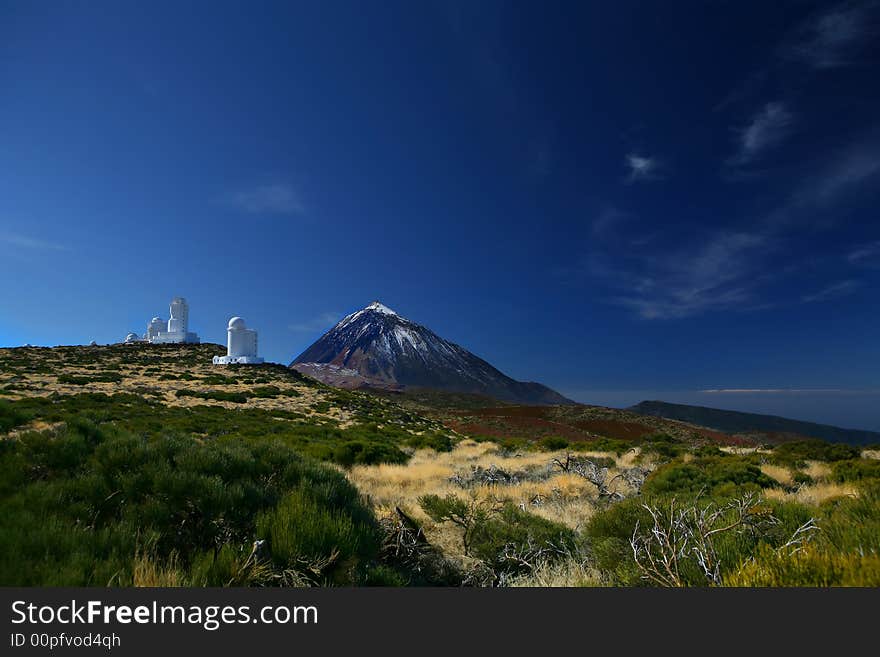 An image of mount Teide and the observation center with a clear blue sky. An image of mount Teide and the observation center with a clear blue sky.