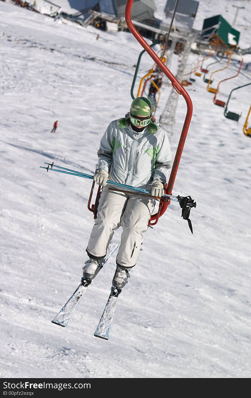 Skier on chair lift