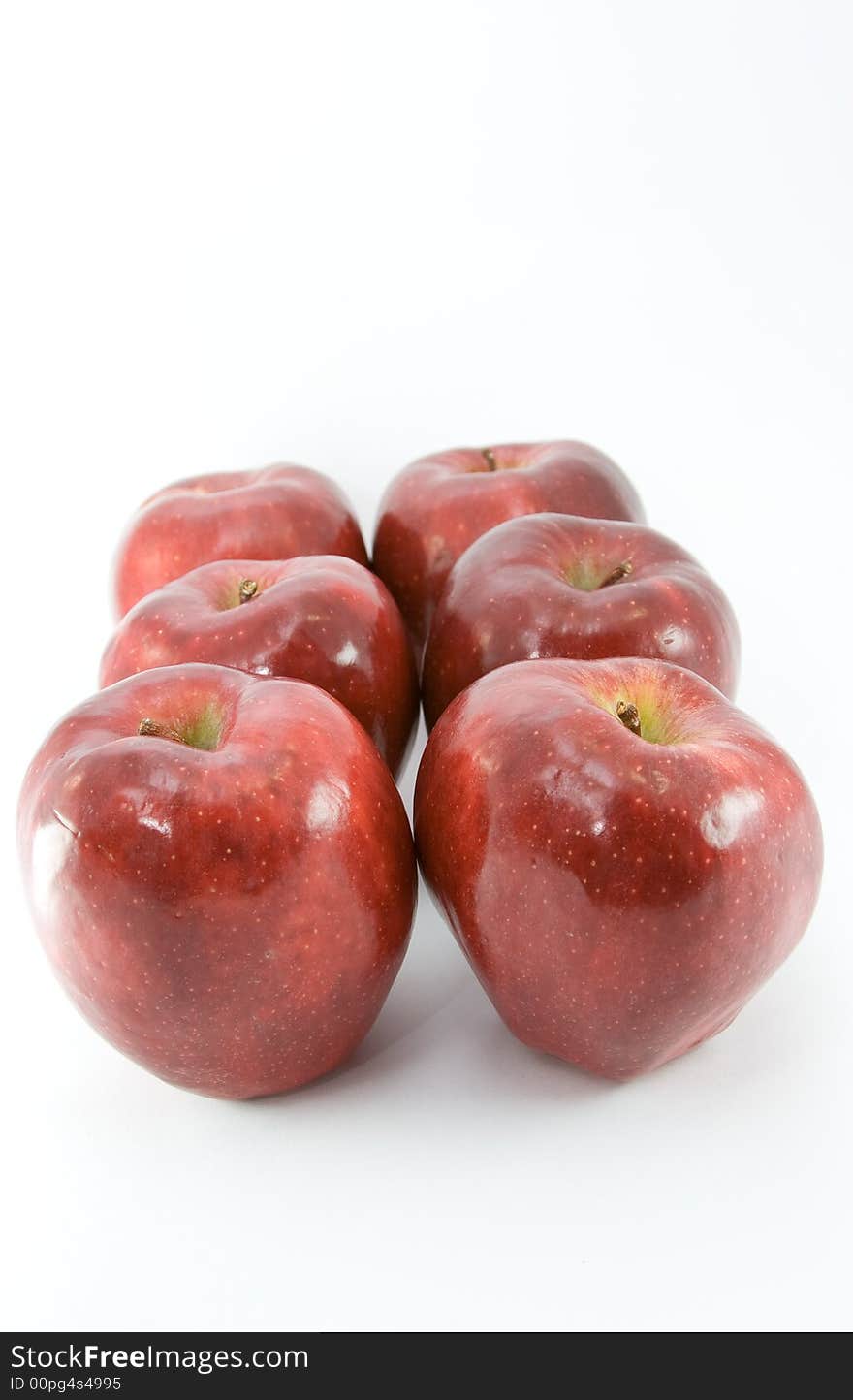 Red apples on white background