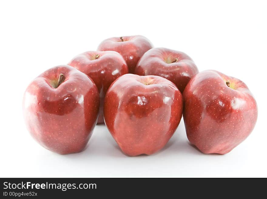 Red apples on white background