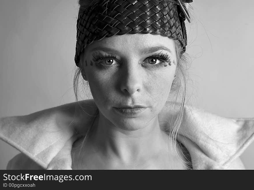 Fashion portrait of a blond girl in black and whit