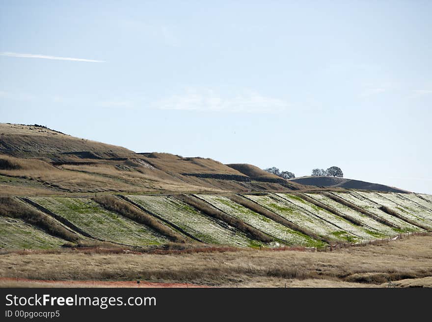 Land that has been tereced and leveled waiting for homes to be built. Land that has been tereced and leveled waiting for homes to be built