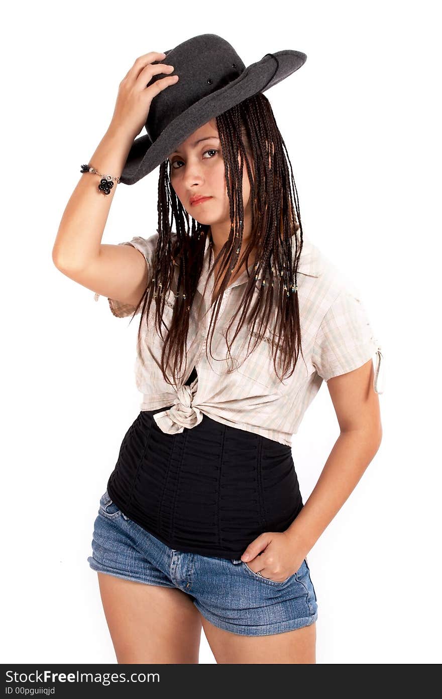 A sexy cowgirl over a white background