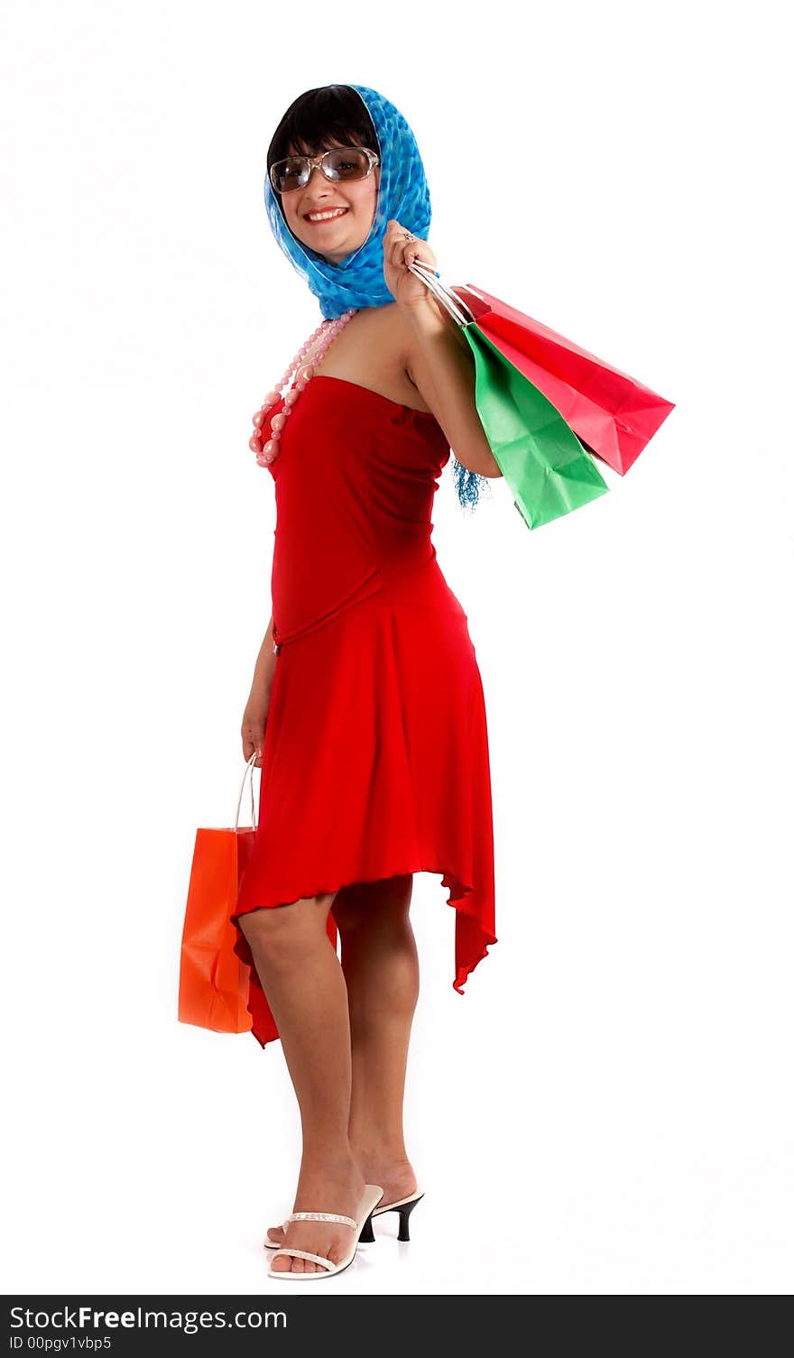 Attractive young woman holding some shopping bags. Attractive young woman holding some shopping bags