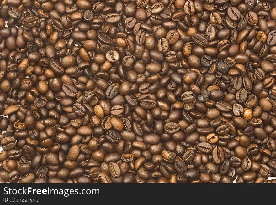 Toasted coffee beans textured background. Toasted coffee beans textured background