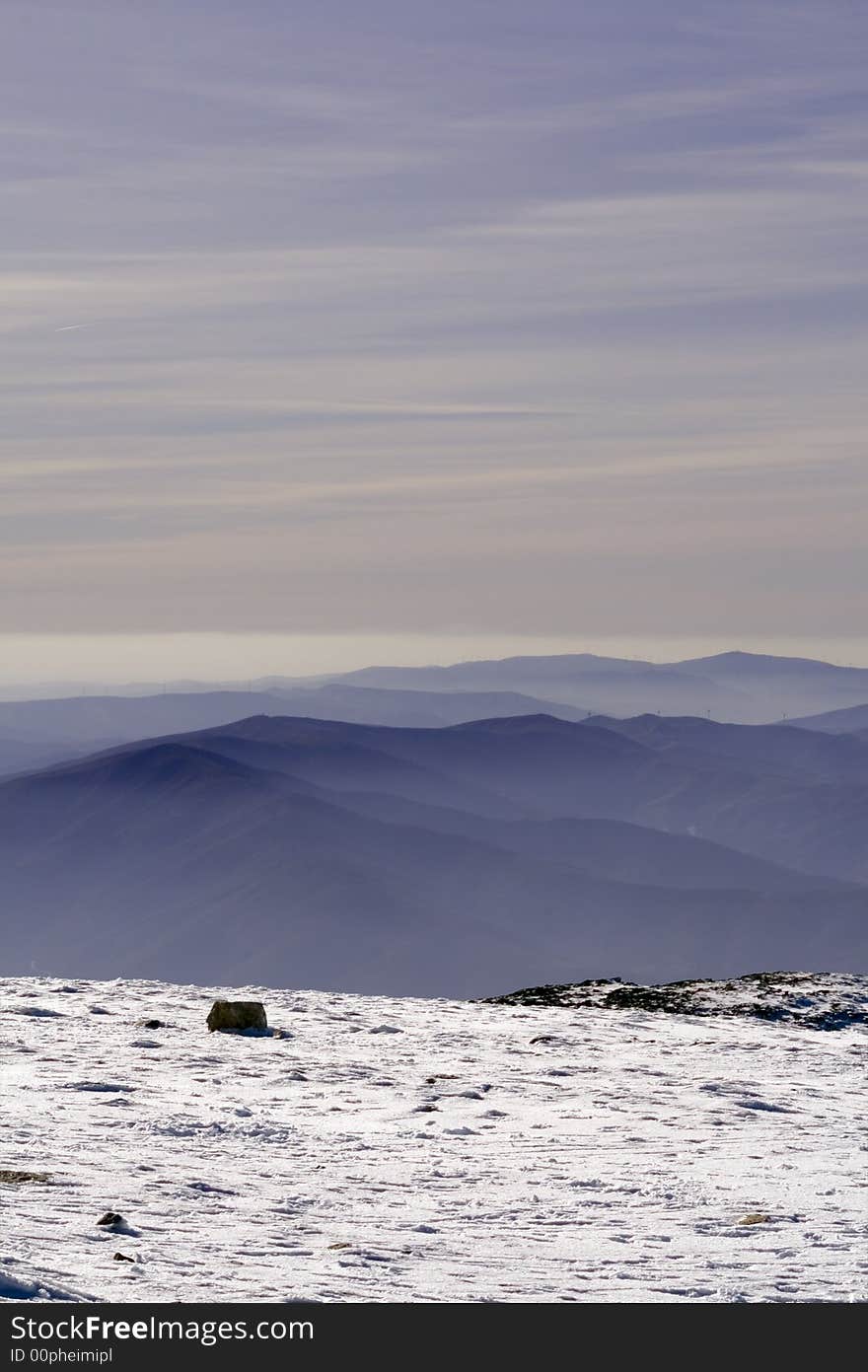 Sunset from one mountain top with snow. Sunset from one mountain top with snow