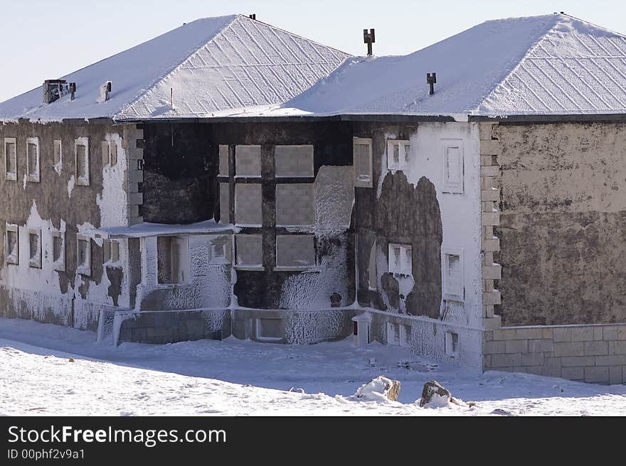 Abandon frozen house, cover in snow