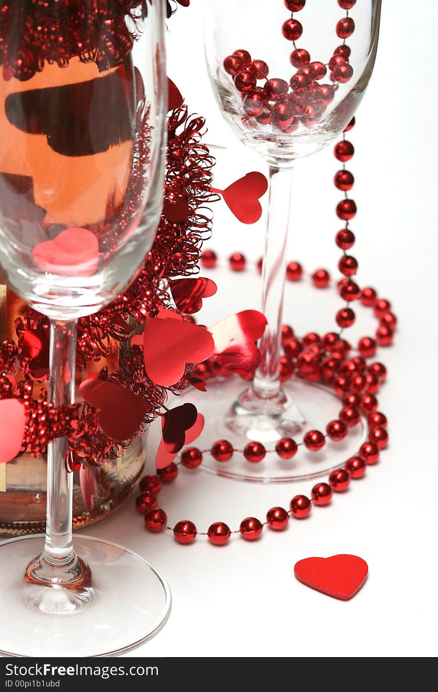 Valentine champagne and two glasses on white background.