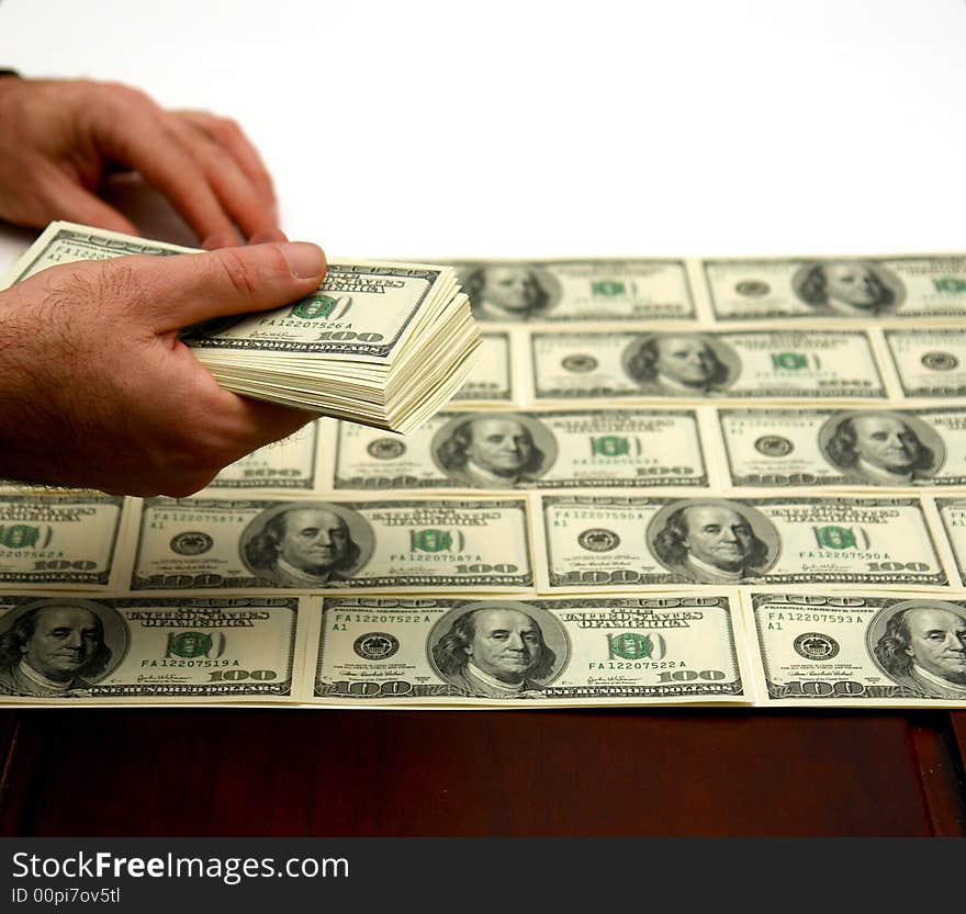 Lining up hundred dollar bills on white background. Lining up hundred dollar bills on white background