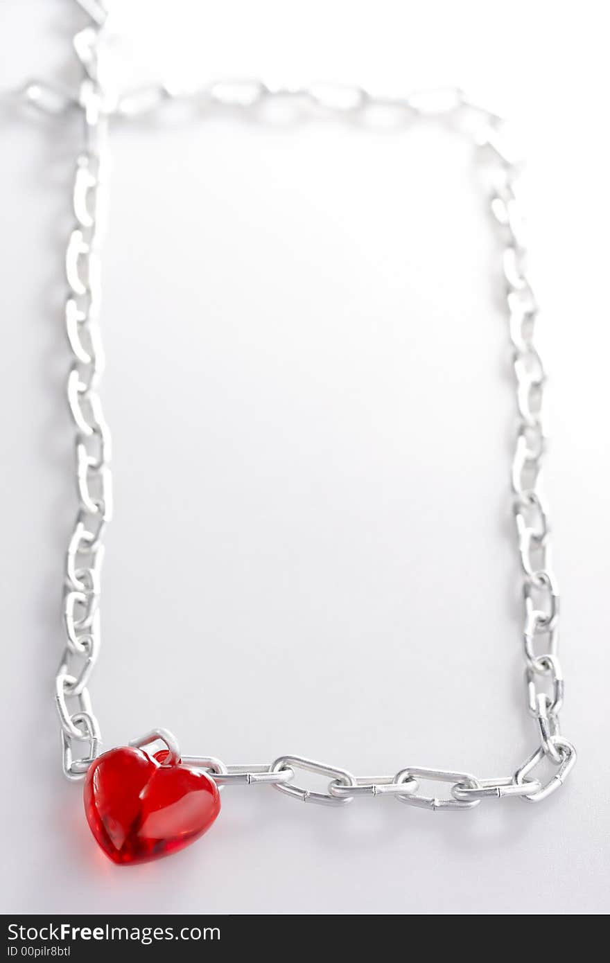 Heart with a chain made in the form of a frame leaving in a distance. Heart with a chain made in the form of a frame leaving in a distance