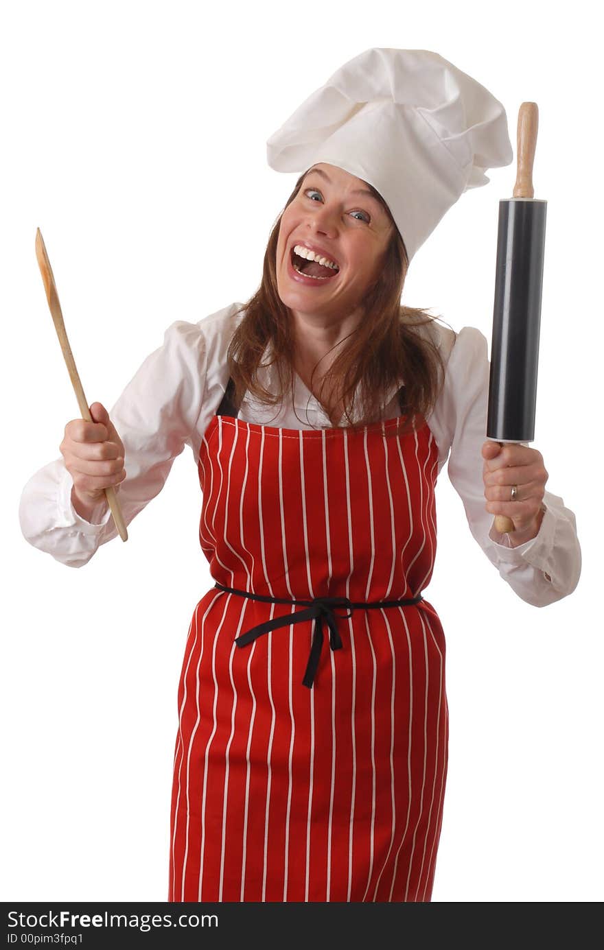 Attractive female chef in red apron smiling, isolated on white. Attractive female chef in red apron smiling, isolated on white