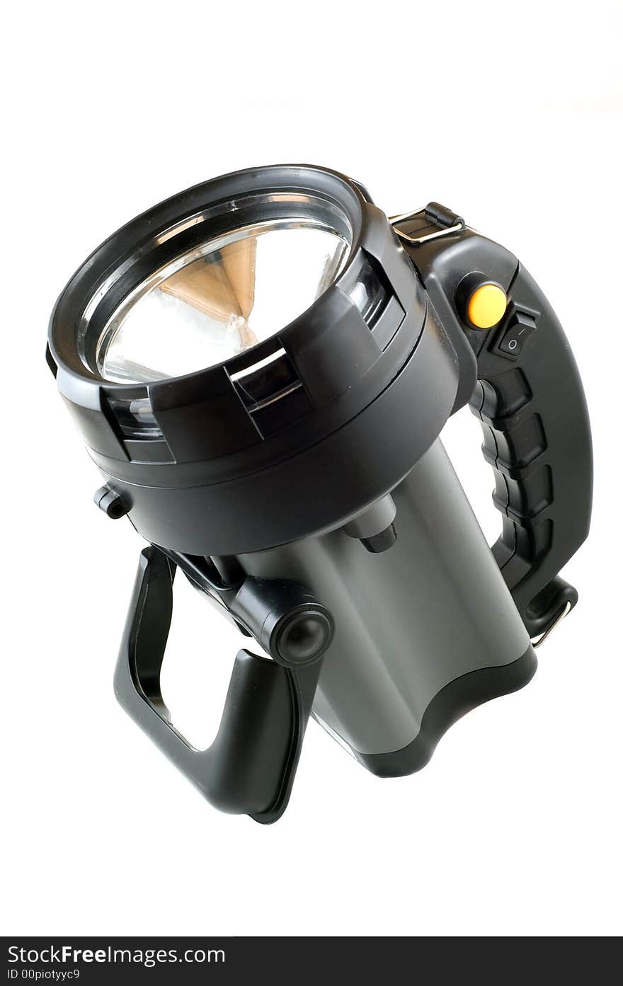 Large plastic halogen flashlight on a white background