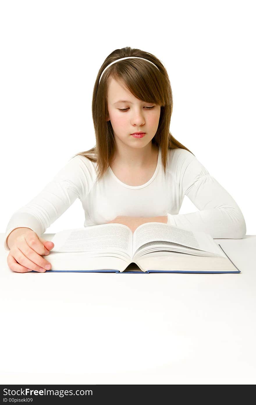 Portrait of Happy young schoolgirl reading book