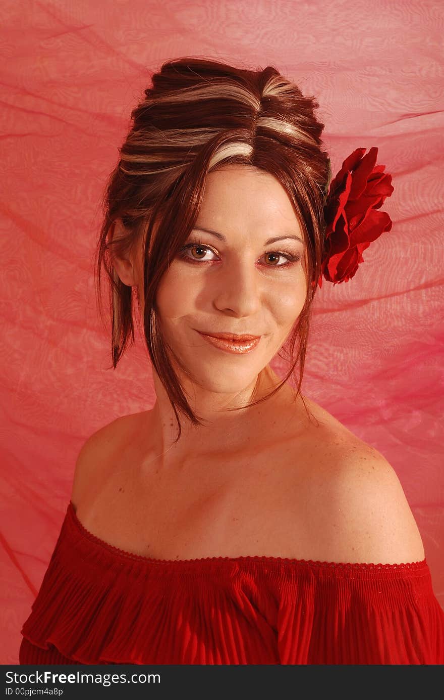 Beautiful portrait of a woman with a flower in her hair