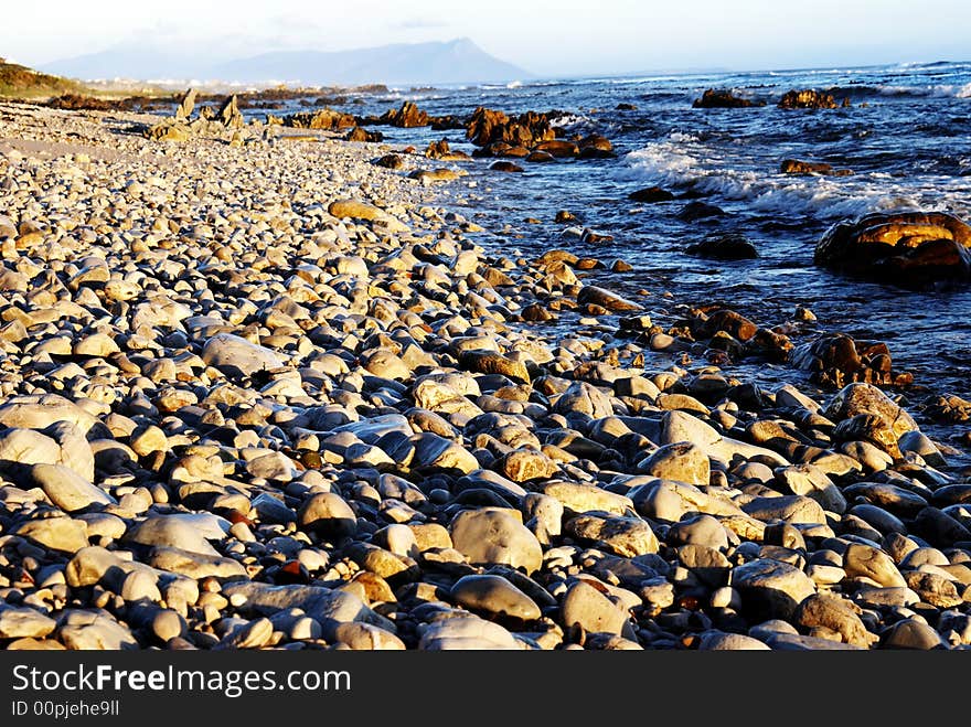 Rocky beach at sunset