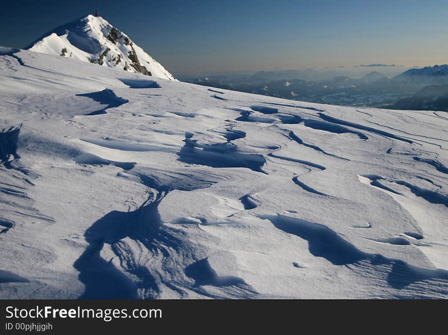 Snow surface shaped by strong wind. Snow surface shaped by strong wind