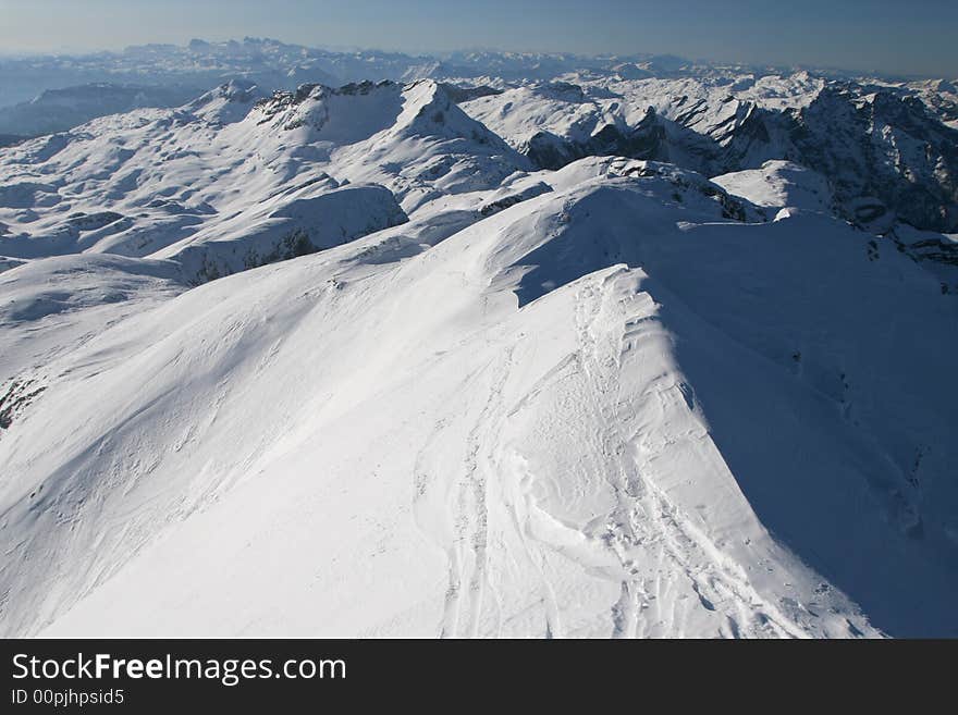 Mountain view - snow-covered ridges. Mountain view - snow-covered ridges