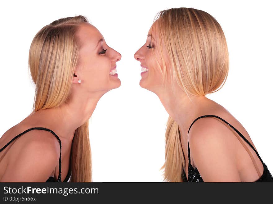 Twin girls face-to-face close-up