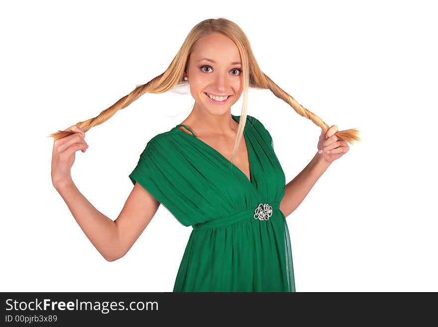 Girl in green holding plaits