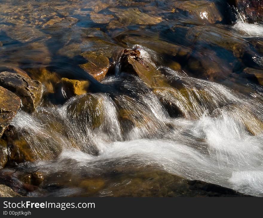 Forest waterfall stream rift in the river. Forest waterfall stream rift in the river