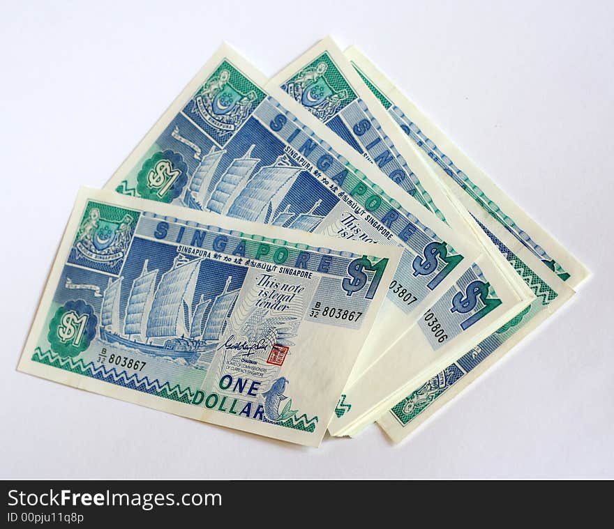 Stack of Singapore one dollar notes. Stack of Singapore one dollar notes.