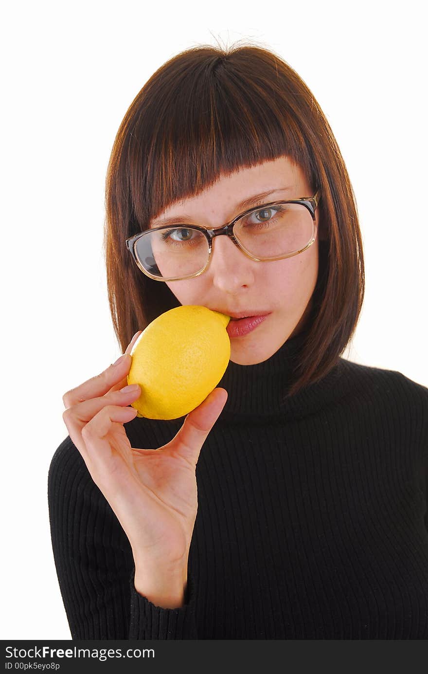 Young ang pretty woman with yellow lemon and glasses. Young ang pretty woman with yellow lemon and glasses