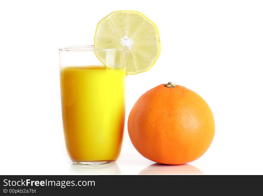 Orange Juice and an orange isolated on white background