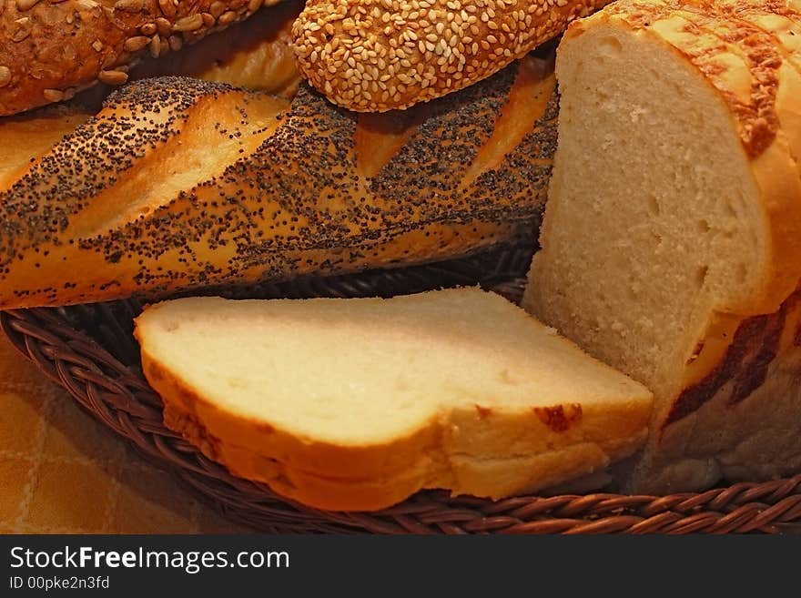 Long loafs and loaves of various kinds of bread. Long loafs and loaves of various kinds of bread