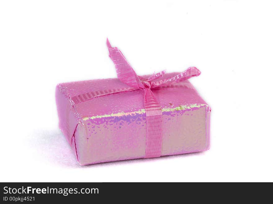 Pink color gift present box with ribbon