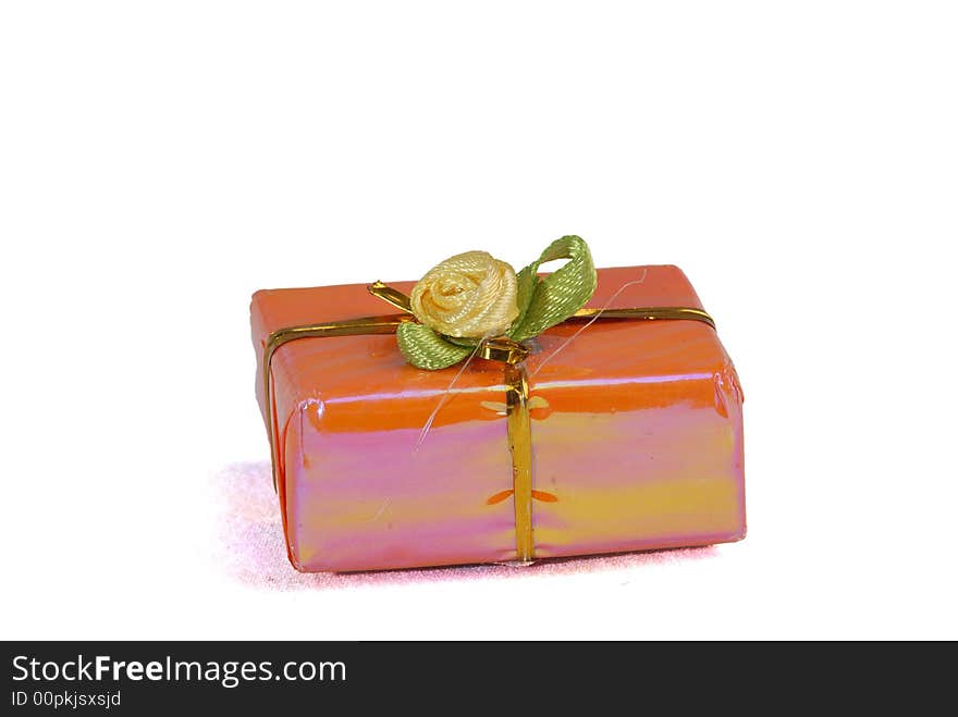 Pink orange color gift present box with ribbon