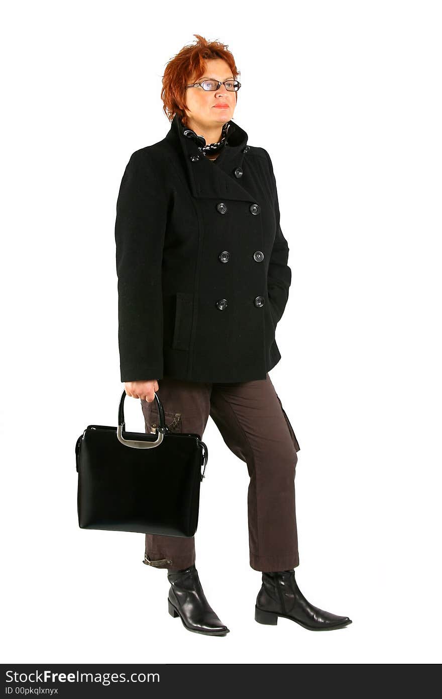 Over white mature businesswoman with briefcase is standing. Over white mature businesswoman with briefcase is standing