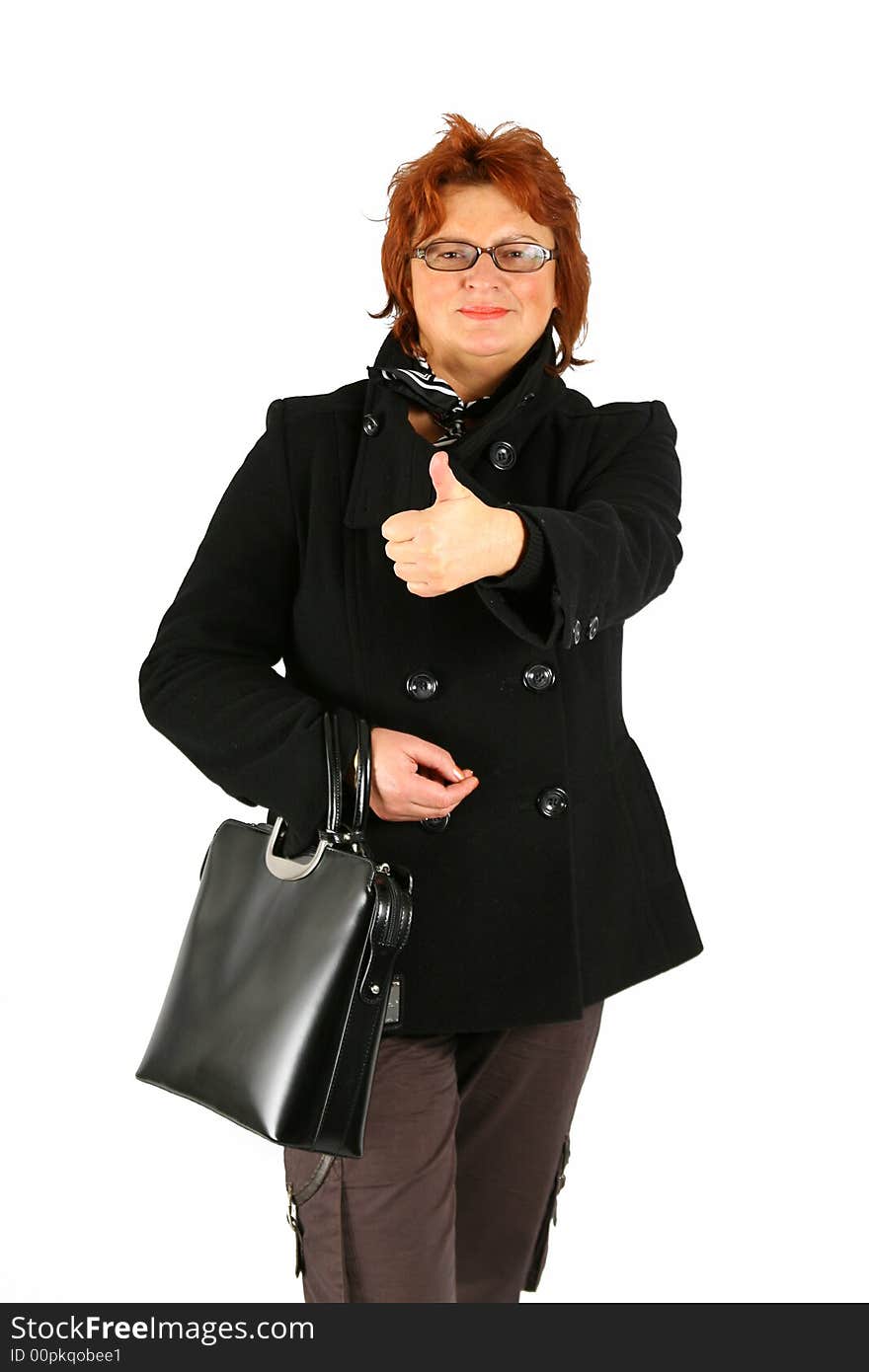 Mature businesswoman is showing that all is ok. Mature businesswoman is showing that all is ok