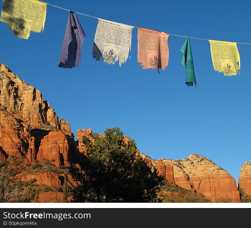 Colorful prayer flags over spiritual sedona. Colorful prayer flags over spiritual sedona