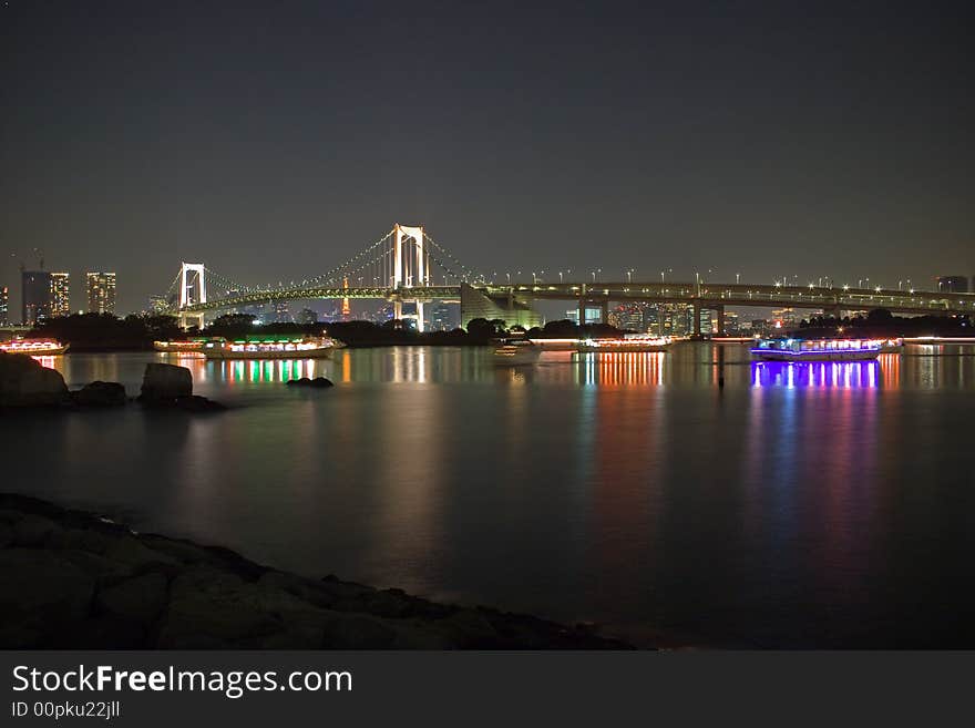 A night shot of the Rainbow Bridge in Tokyo, Japan. A night shot of the Rainbow Bridge in Tokyo, Japan