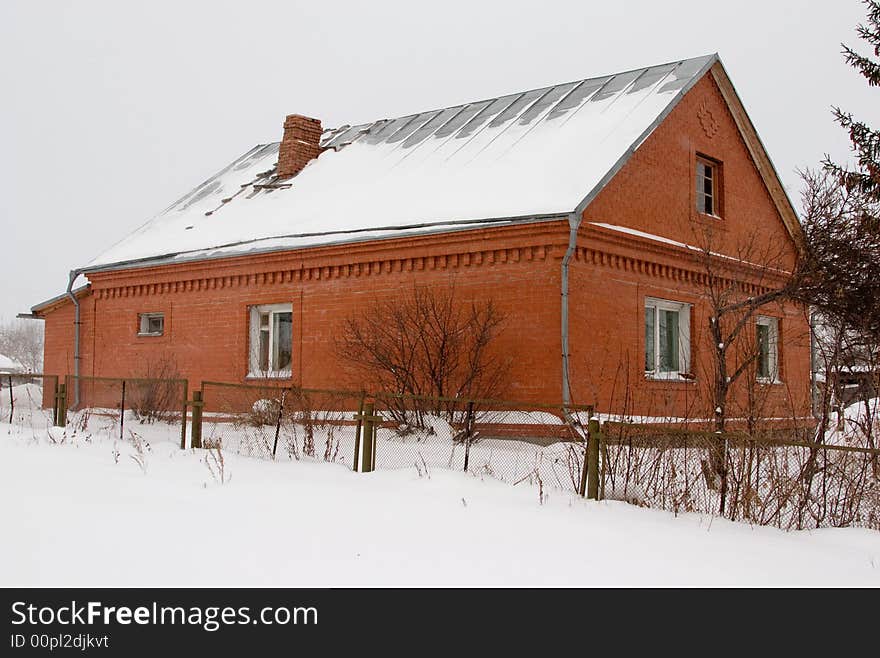 The rural brick house.