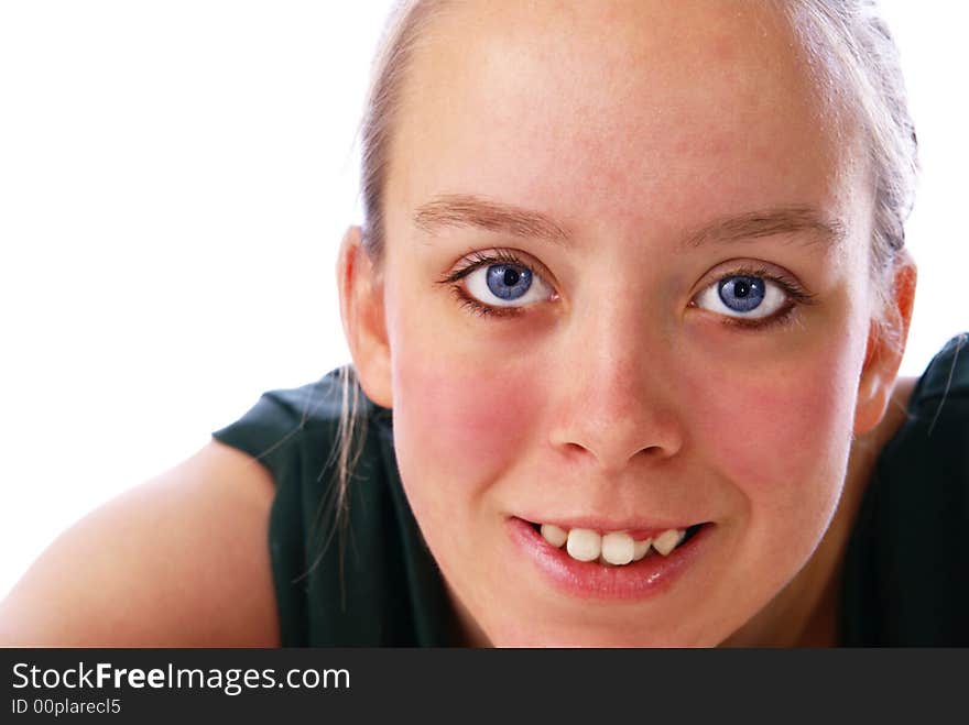 Beautiful blue eyes. Close up of teenage girl's face and eyes.