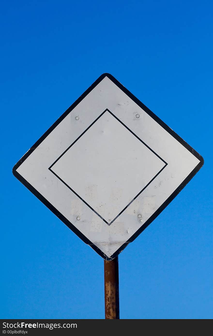 Traffic sign isolated on clear blue sky