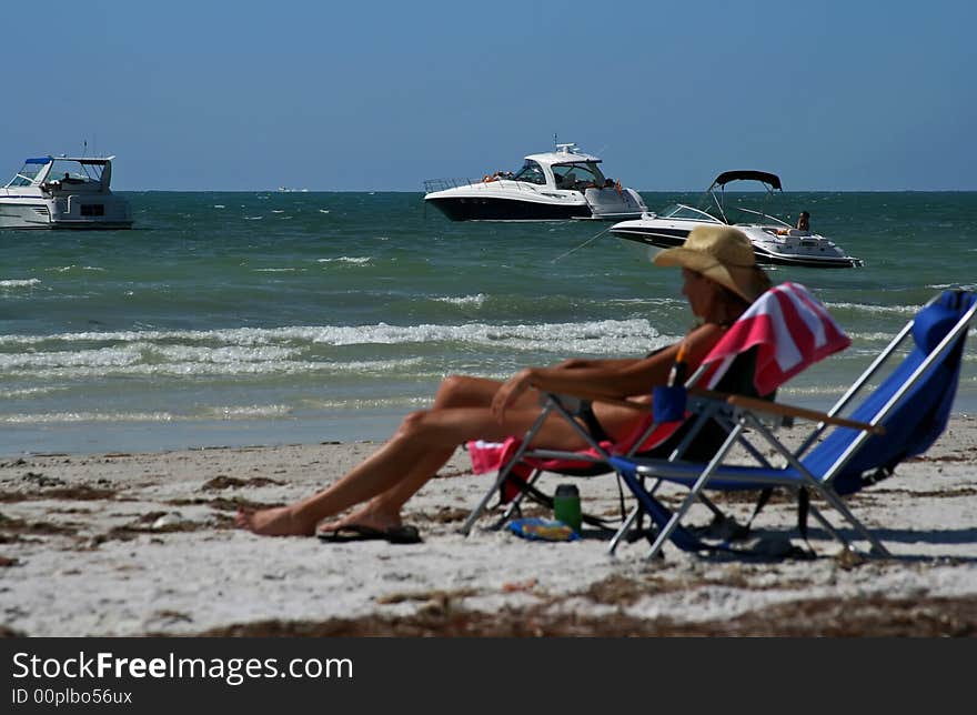 Girl sunbathing on beach