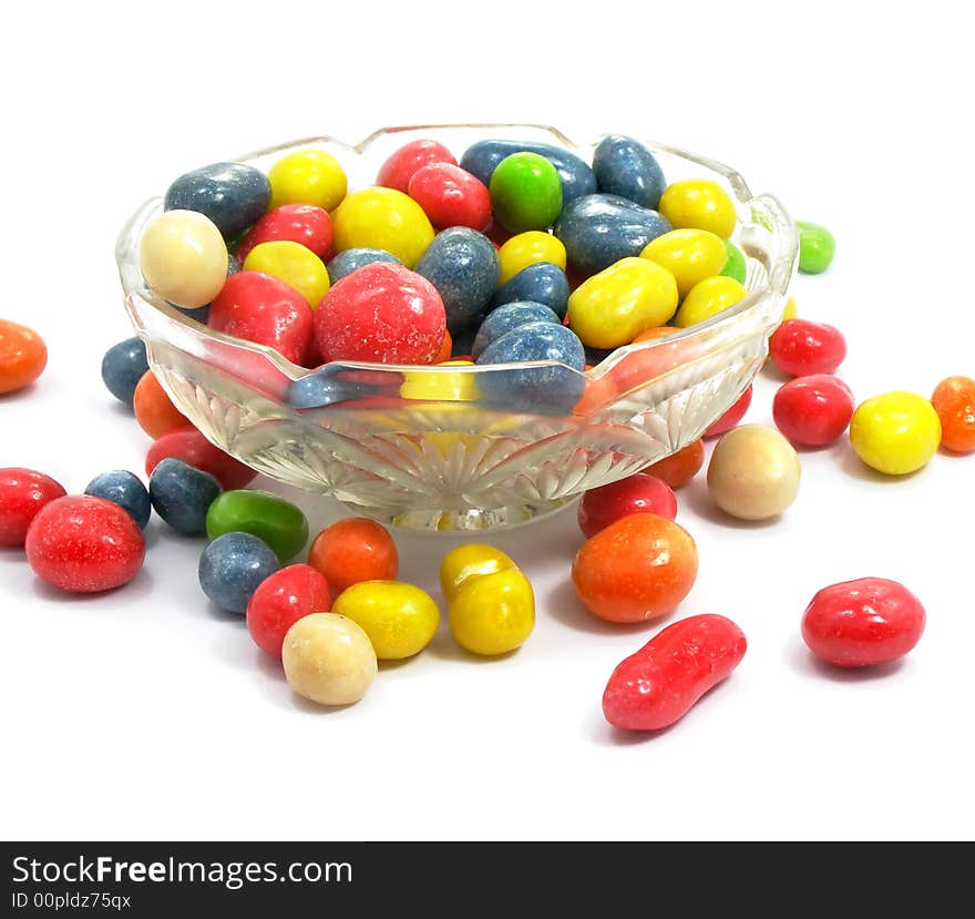 Group of coloured sweet candies isolated over white background