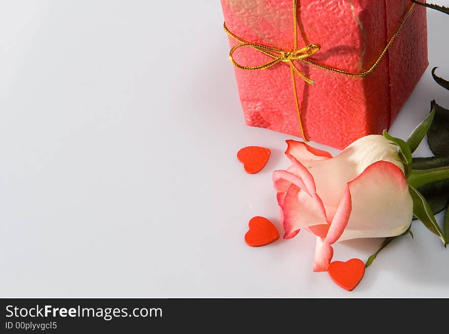 The rose and a present box