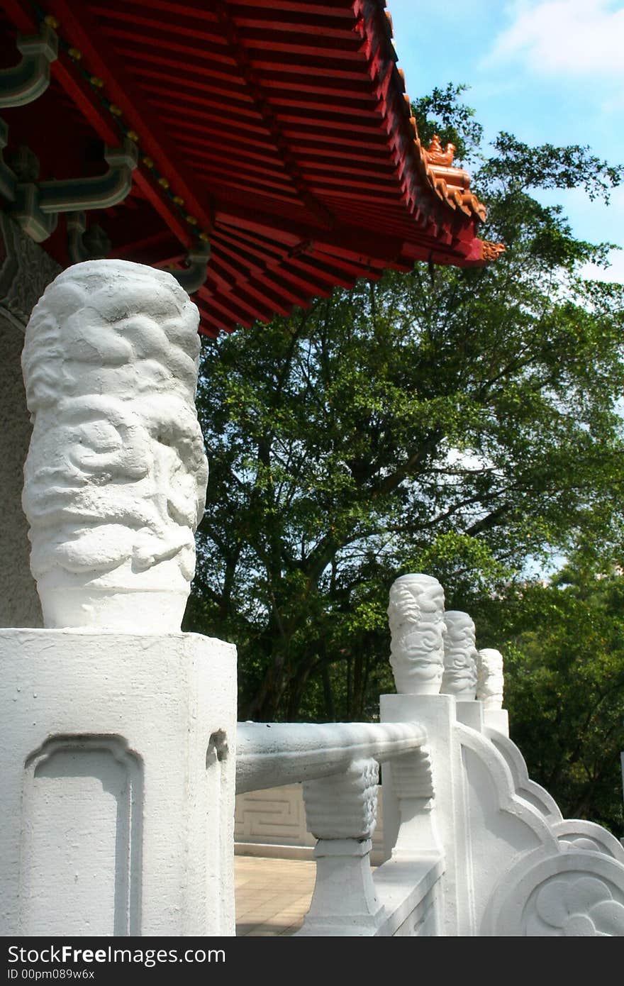 An old japanese architecture ceiling and entrance statues. An old japanese architecture ceiling and entrance statues