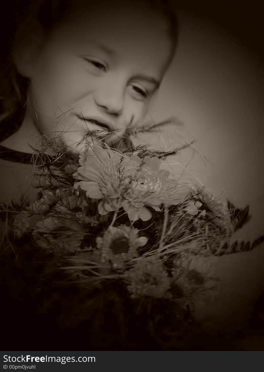 Boy with flower in sepia tone